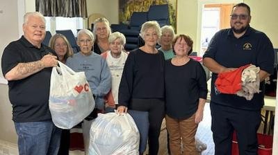 Monroe Lodge donates winter items to Liberty Baptist's Clothes Closet