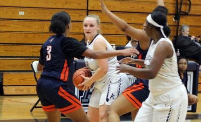 Lady Raiders hold off Heritage comeback attempt