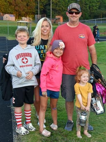 Raiders fall to Altavista on football Homecoming Night; child cancer survivor honored