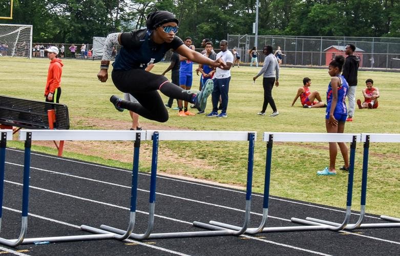 Glover awarded ‘Outstanding Female’ at varsity Dogwood track meet; AMS boys and girls win home meet